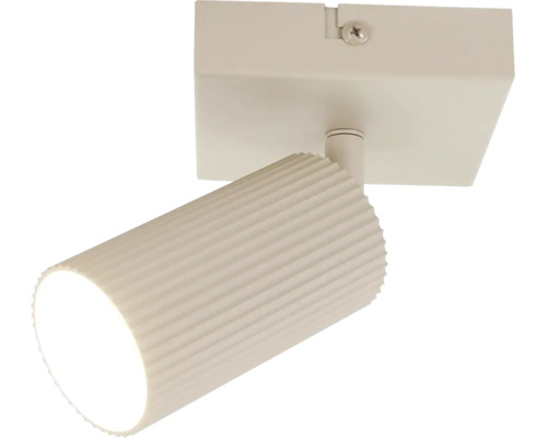 Een enkele plafondspot met een geribbelde cilindrische lampkop voor directe verlichting.