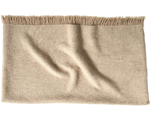 Een zachte woondeken met franjes van textiel voor in de woonkamer of slaapkamer