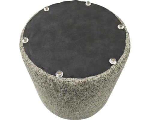 Onderkant van een ronde hocker met gestructureerde stoffen bekleding en gemonteerde kunststof glijders.