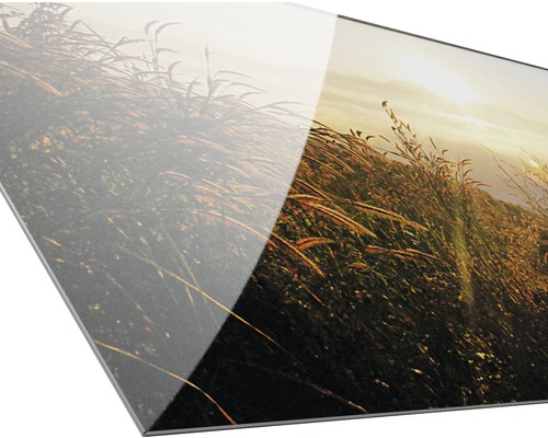 Close-up van een acrylglasplaat met landschapsmotief