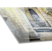 Close-up van een acrylglasplaat met de afdruk van een oud gebouw