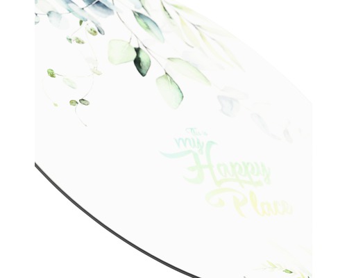 Detailopname van een tafelblad met eucalyptusbladeren en de tekst: This is my happy place.