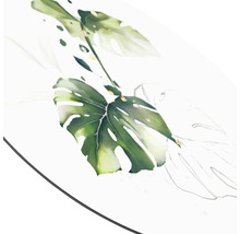 Close-up van een tafel met een Monstera-bladmotief