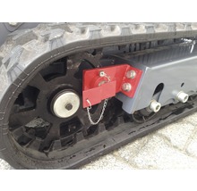 Detailweergave van een rupsband aan een bouwmachine