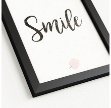 Ingelijste afbeelding met het woord Smile en bladmotief