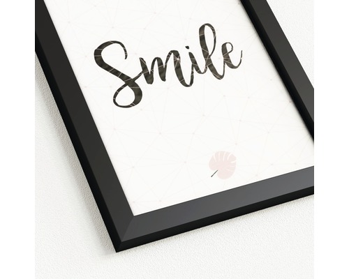 Ingelijste afbeelding met het woord Smile en bladmotief