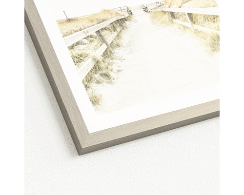 Ingelijste afbeelding met strandthema en houten frame