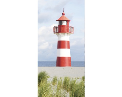 Vuurtoren op een duin met begroeiing