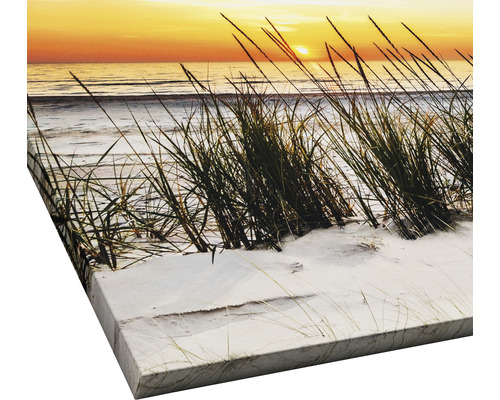 Canvas schilderij met strandmotief en gras op de voorgrond