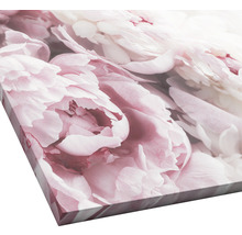Close-up van een canvas schilderij met een bloemmotief