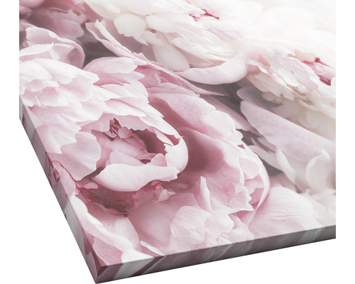 Close-up van een canvas schilderij met een bloemmotief