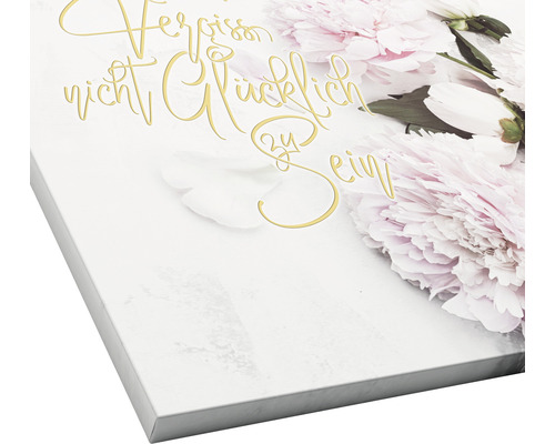 Canvas schilderij met bloemmotief en de spreuk Mis het niet om gelukkig te zijn