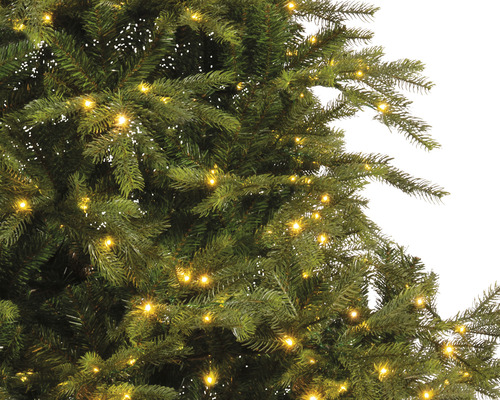 Close-up van een versierde kerstboom met lichtjes.