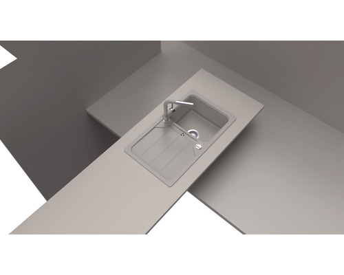 Keuken spoelbak met afdruiprek en kraan op een aanrechtblad