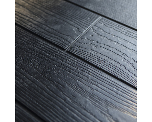 Close-up van kunststof gevelbekleding in houtlook