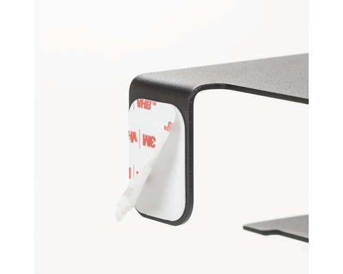 Detailweergave van een bevestiging met plakstrip