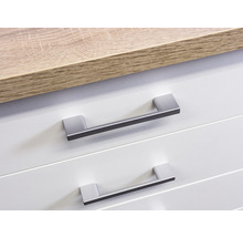 Detailopname van een kast met twee laden en handgrepen