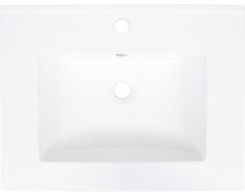 Wastafel van keramiek met kraangat en overloop