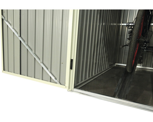 Binnenaanzicht van een metalen fietsberging met een fiets