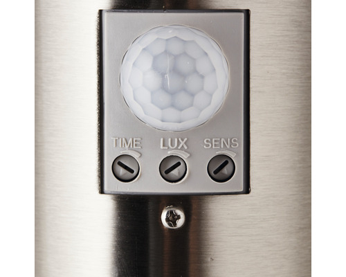 Close-up van een bewegingssensor met instellingen voor tijd, lux en gevoeligheid