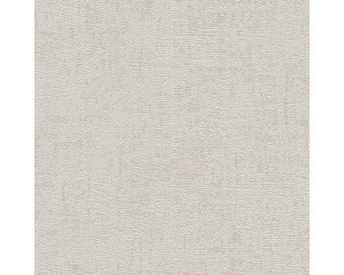 Close-up van een lichtgekleurd structuurbehang met een fijne, onregelmatige afwerking