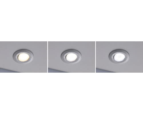 Drie inbouwspots met verschillende lichtkleuren