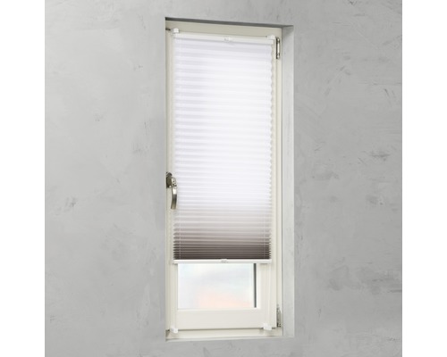 Plisségordijn in het raam