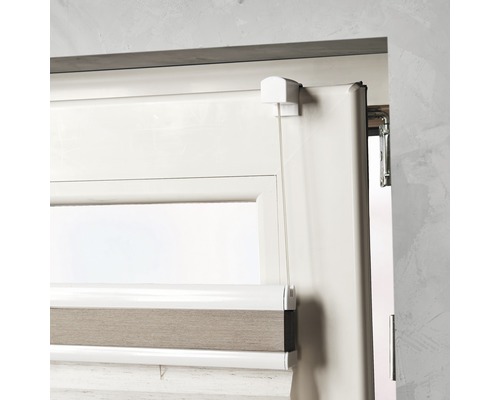 Detailweergave van een roljaloezie op een raam