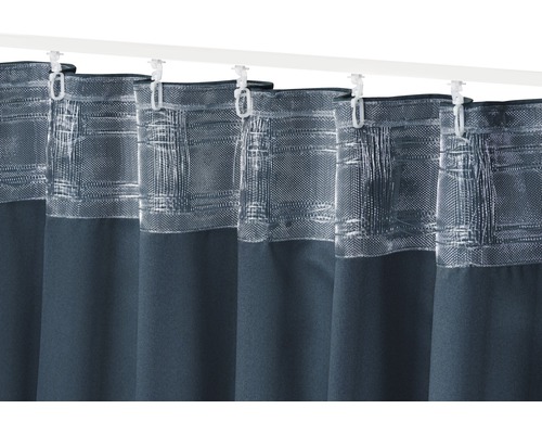 Gordijn met patroonprint en gordijnrolletjes aan een gordijnrail