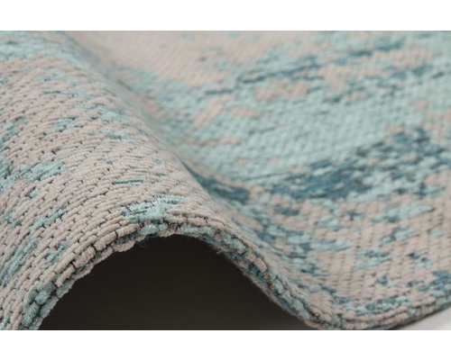 Detailopname van een opgerold tapijt