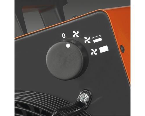 Close-up van een elektrische kachel met temperatuurregelaar