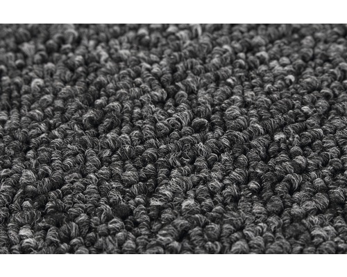 Close-up van een grijs tapijt met lussenstructuur