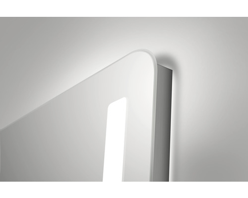 Detailopname van een verlichte spiegel met afgeronde hoeken