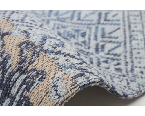 Detailopname van een vloerkleed met patroon
