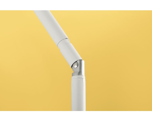 Gedetailleerde opname van een verstelbare, witte lamphouder