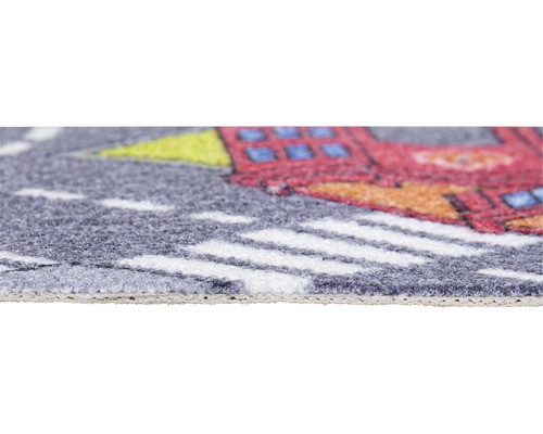 Detailopname van een speelkleed met straatmotief en voertuigen