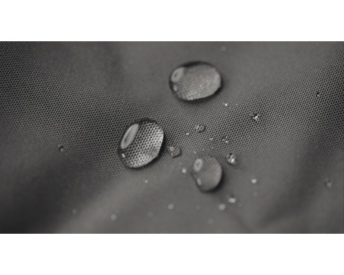 Close-up van waterdruppels op waterafstotende stof