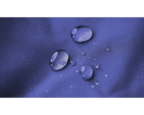 Close-up van waterdruppels op waterafstotende stof