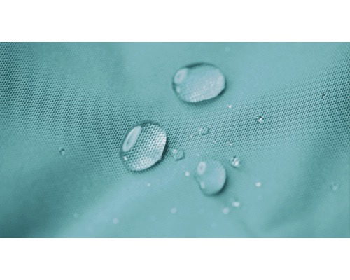 Close-up van waterdruppels op waterafstotende stof.