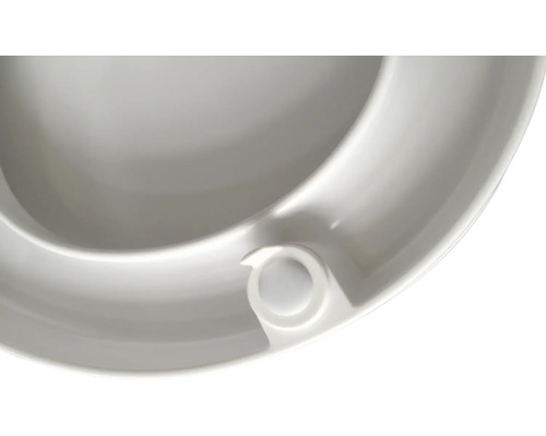 Detailopname van een toiletzitting van kunststof