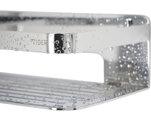 Tiger Logo op een metalen badkamerplank