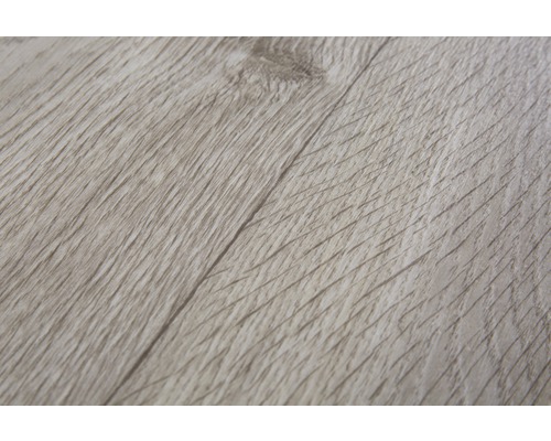 Close-up van een laminaatvloer met houtstructuur