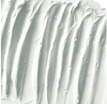 Close-up van een aangebrachte, pasteuze massa