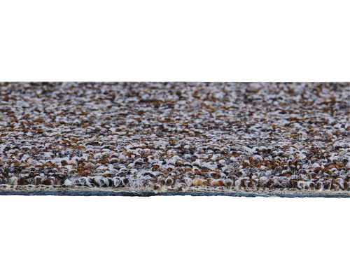 Detailopname van een tapijt met noppenstructuur.