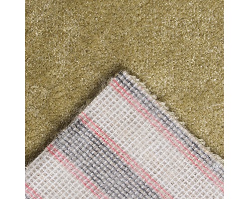 Detailaanzicht van een tapijt met textielrug