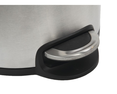 Detail van een pedaalemmer met voetpedaal.