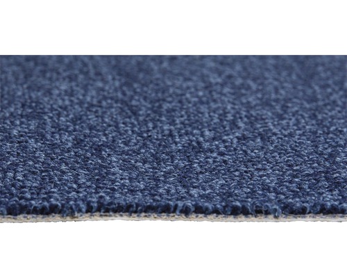 Close-up van een blauw tapijt met lusstructuur.