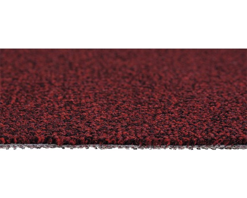 Detailopname van een rode vloerbedekking