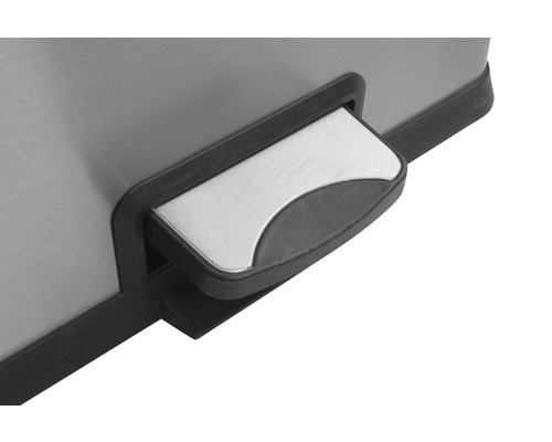 Detailopname van een afvalemmer met pedaalmechanisme.