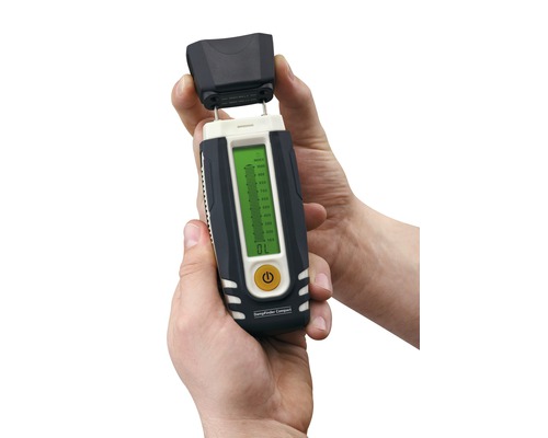 Vochtigheidsmeter in de hand, met verwijderde beschermkap